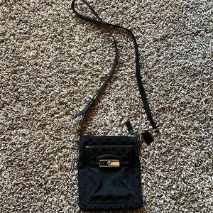 Black cross body Coach purse